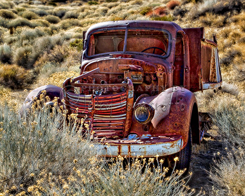 An old rusty truck by an abandon mine in Death Valley National Park.