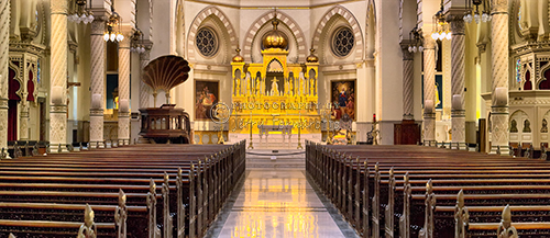 This is a panoramic view of the interior of the Immaculate Conception Jesuit Church. 