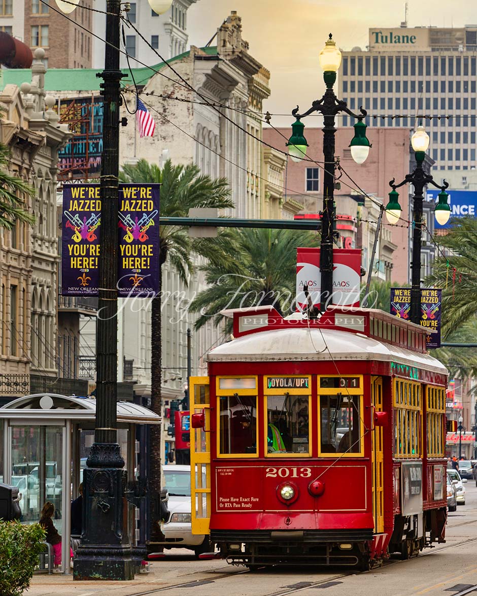 The iconic New Orleans Street Car on Canal Street. The Canal Street line was reopened it in 2004 after having been replaced by a bus route in 1964. Its bright red cars are modeled on the historic Perley Thomas streetcars