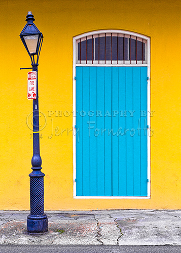 A colorful door and lamppost in the French Quarter of New Orleans.