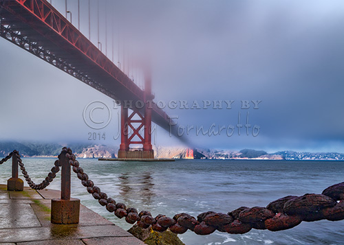 Golden Gate Bridge in fog from Fort Point.