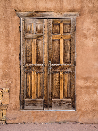 An old weathered wooden door found in Taos, New Mexico.