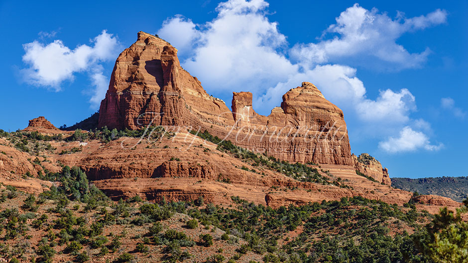 The Thumb Butte and The Bench as seen from Schnedly Hill Road, Sedona, Arizona.
