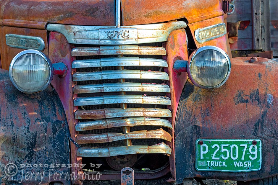 Old rusty GMC truck.