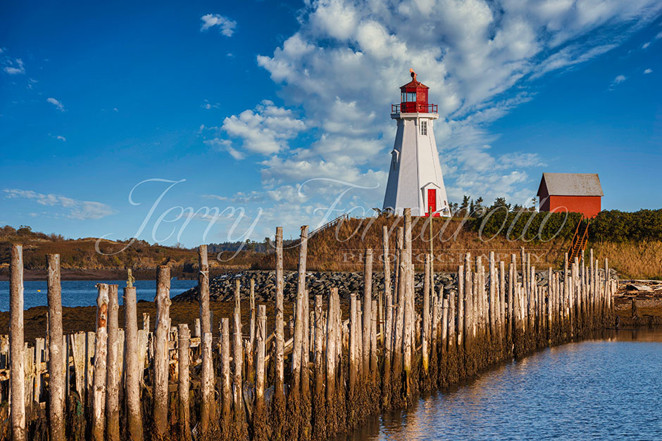 Mullholland Point Lighthouse is near the southern end of Campobello Island to guide vessels through Lubec Narrows, the small passage between the island and the United States mainland.