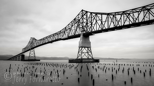 The Astoria-Megler Bridge crosses the Columbia River. This steel cantilever bridge is 4.1 miles long.