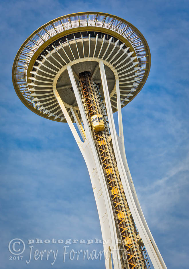 The Space Needle is located in Seattle Center. It is 605 feet tall. b