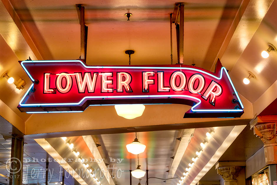A retro style neon sign at the Pike Place Market, Seattle, Washington. Canon 5D MKIV, Canon 70-200m set to 70mm, 1/15sec, f11