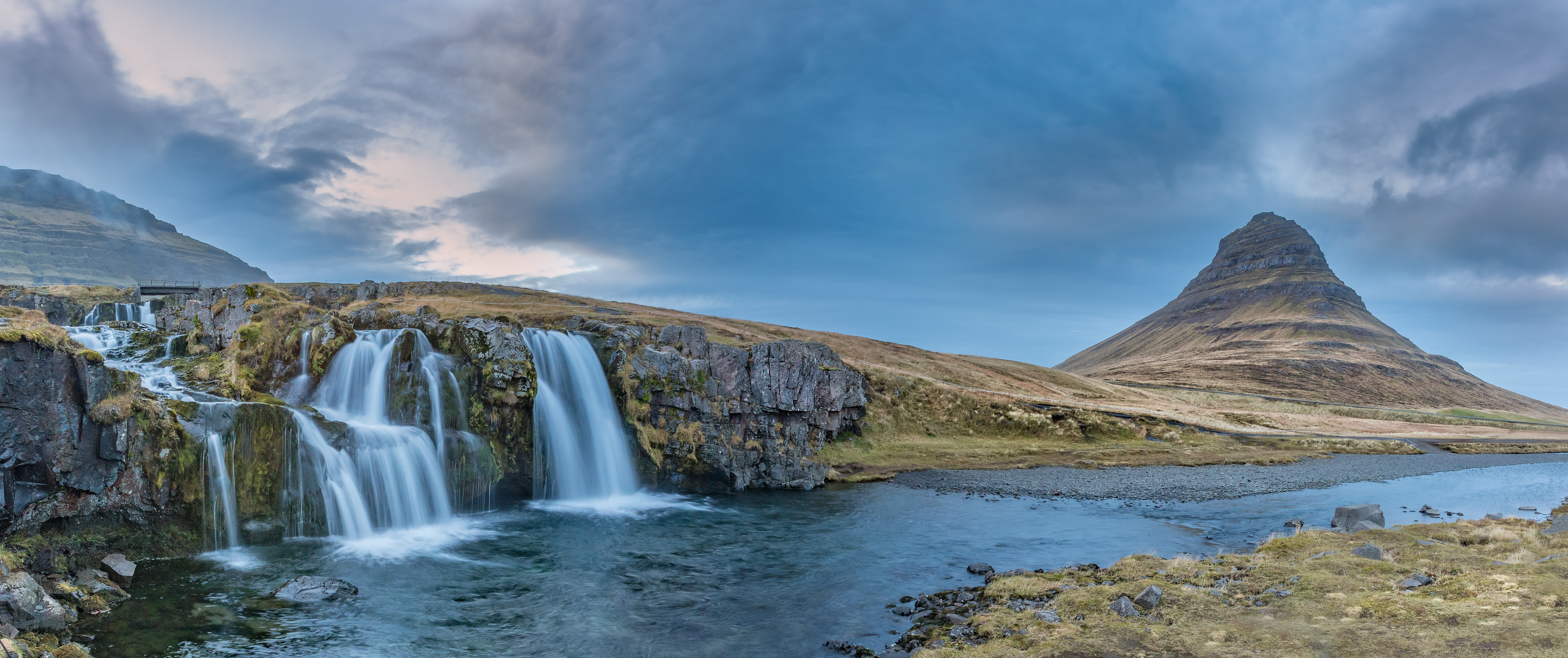Kirkjufell Waterfall is located on the Snaefellnes Peninsula, Iceland.