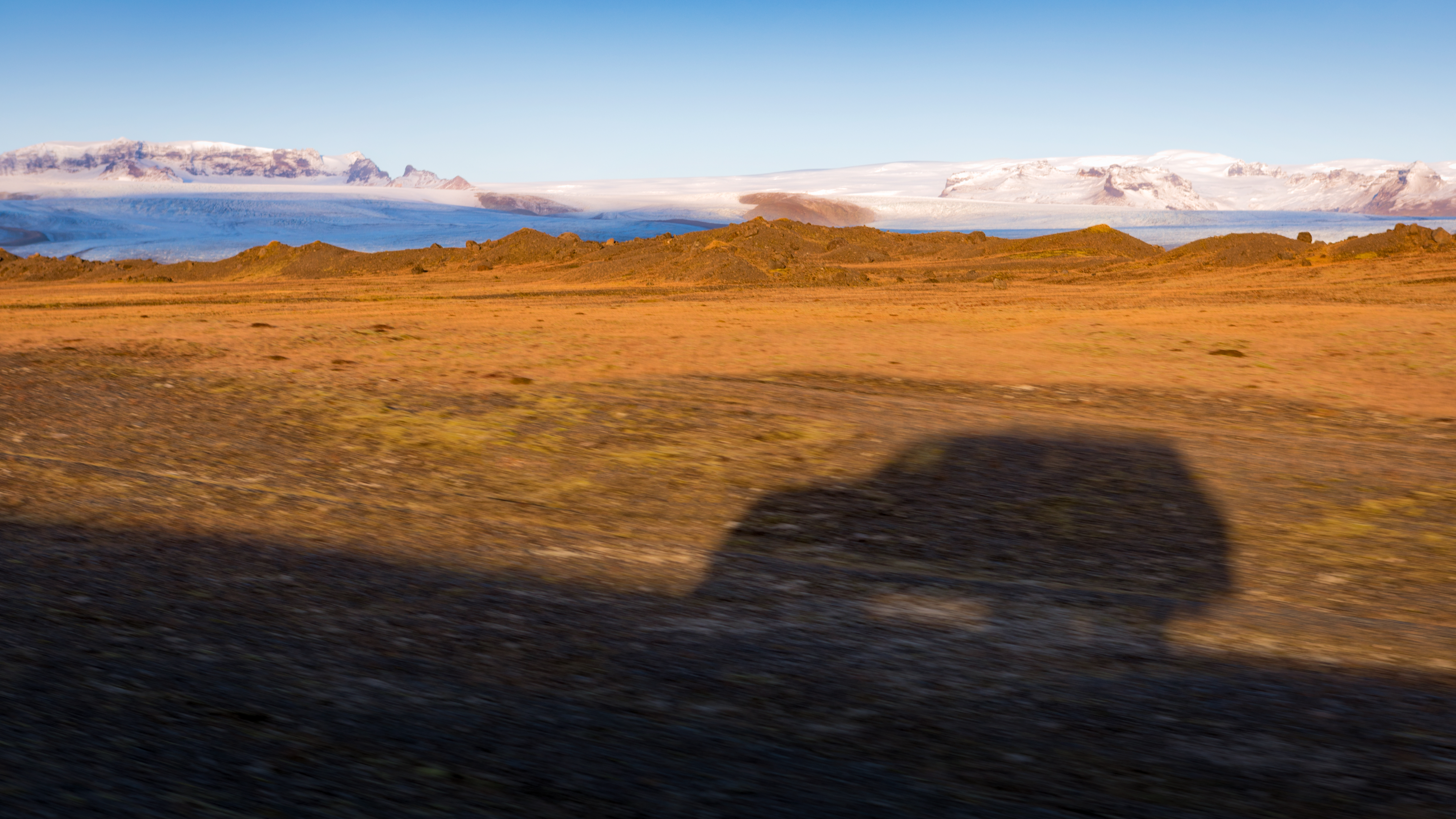 The shadow of my cay while driving the Ring Road, Iceland.