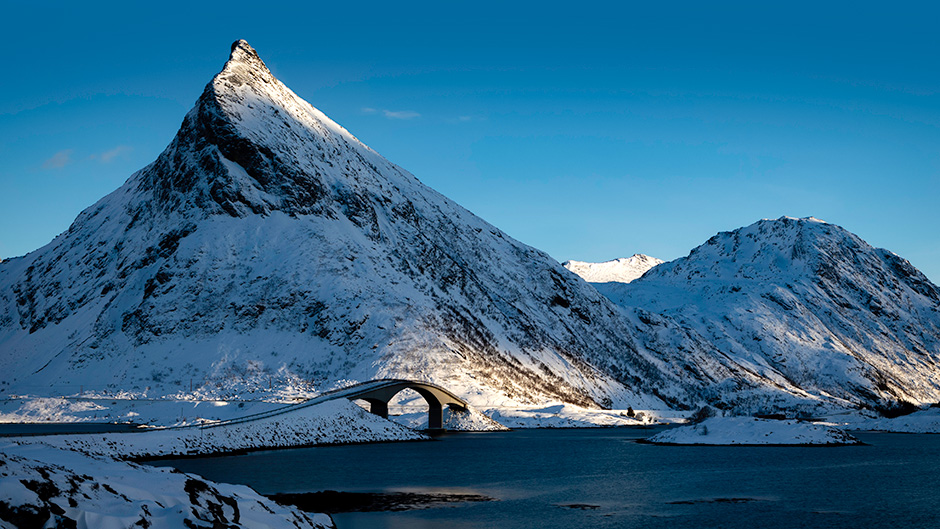 Fredvang Bridge is a cantilever bridge that connects the villages of Fredvang and Flakstadoya in the Lofoten Islands, Norway.